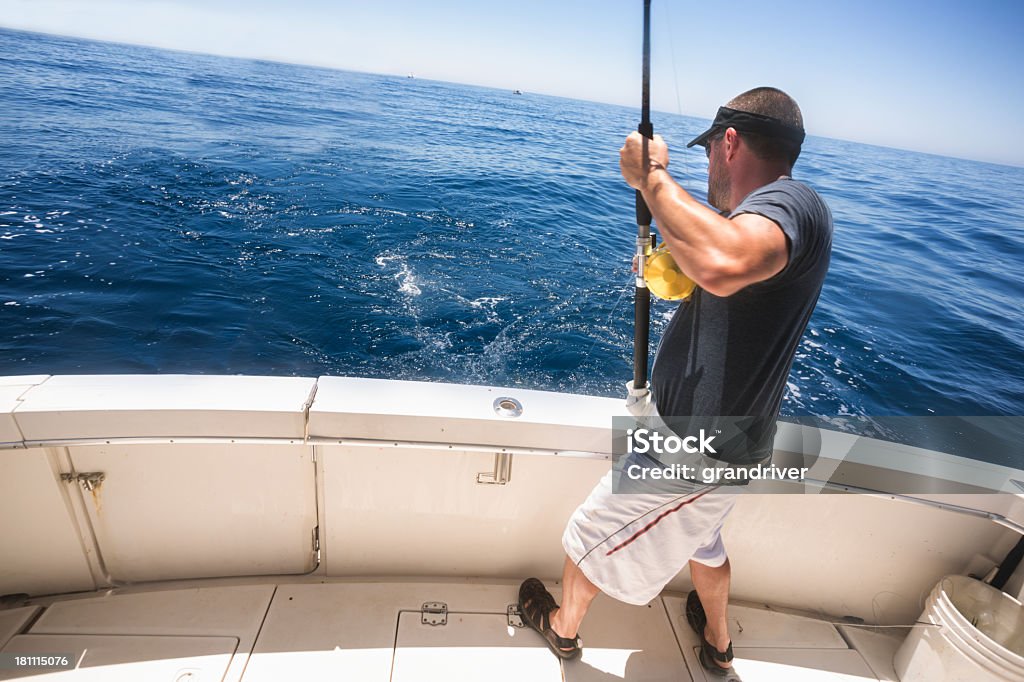 young man deep sea fishing
