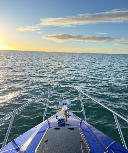 Bow view out to ocean on sunny day